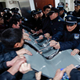 People clash with police as they try to visit relatives injured in a stampede, at a hospital in central Shanghai on New Year's Day.
